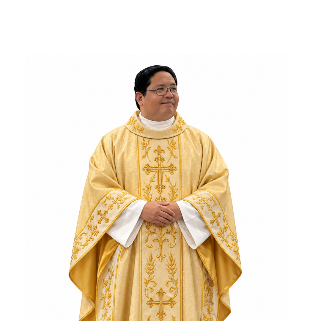 Rev. Fr. Paulo Baria Barandon wearing gold priestly vestments